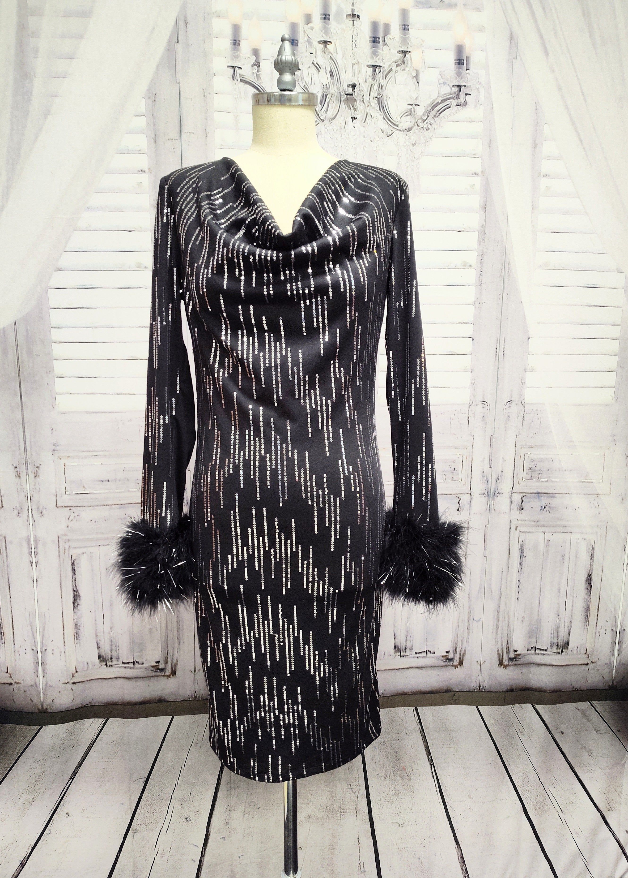 Black knit and silver sequin dress with feather cuffs