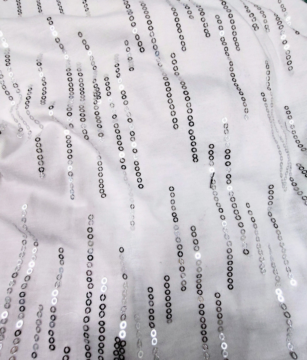 Black knit and silver sequin dress with feather cuffs