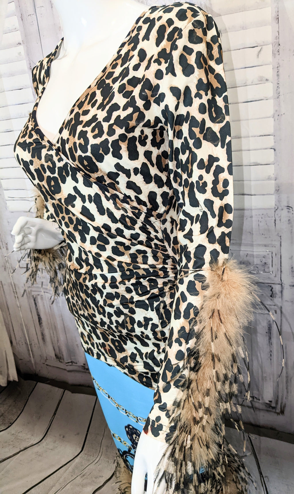 Cheetah Printed V-neck Top with Ostrich Feather Trim Sleeves