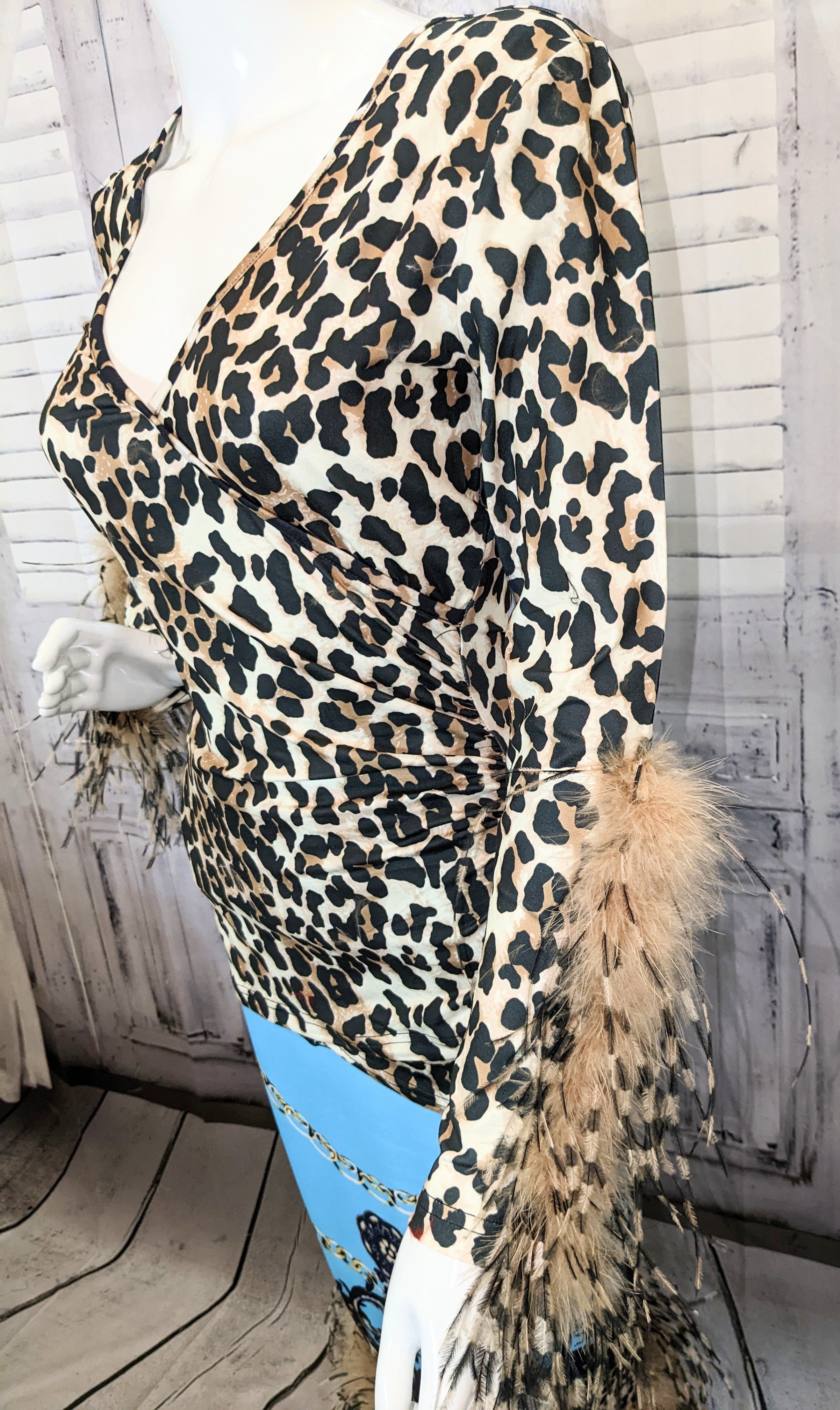Cheetah Printed V-neck Top with Ostrich Feather Trim Sleeves