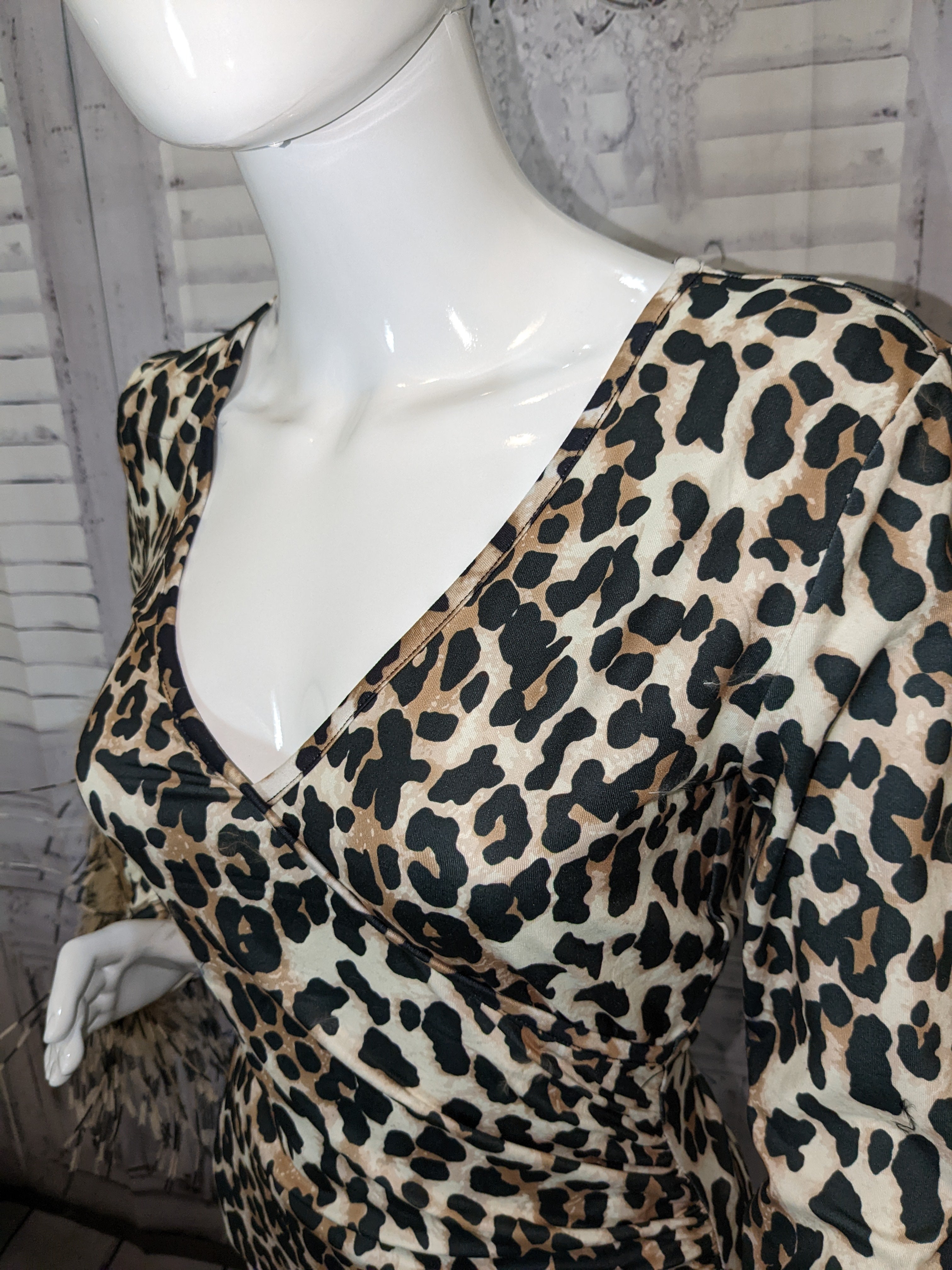 Cheetah Printed V-neck Top with Ostrich Feather Trim Sleeves